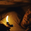 ryan reynolds regardant la flamme