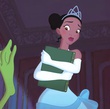 tiana regardant une patte de grenouille