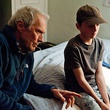 Clint Eastwood sur le lit