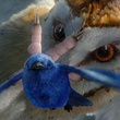 une chouette attrapant un oiseau