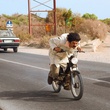 Ramzy Bedia sur la mobylette