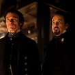 luke-evans-john-cusack-jpg
