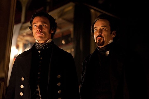 luke-evans-john-cusack-jpg