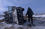 une-voiture-renversee-jpg