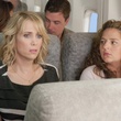 kristen-wiig-en-avion-jpg