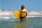 Jean Dujardin et sa planche de surf