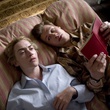 Kate Winslet et David Kross en train de lire