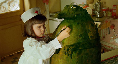 flora guiet osculte un crocodile