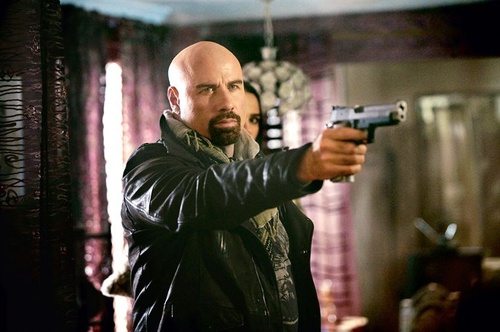 john travolta arme en main