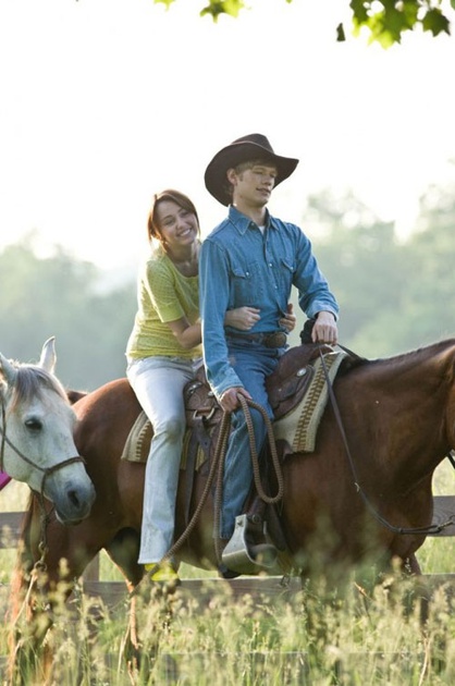 miley cyrus and lucas till on a horse