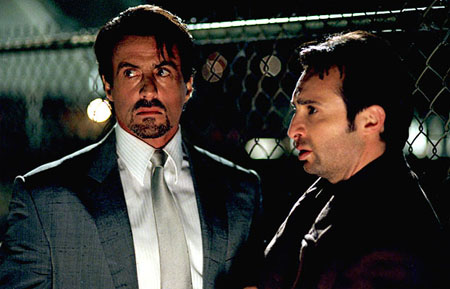 sylvester stallone a gauche de la photo